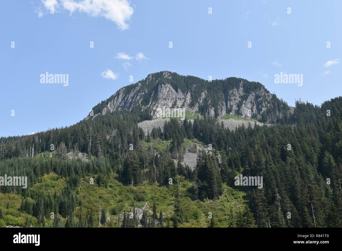 Scenic mountain and trail views of both Bearhead Trail and the Granite Lakes in the Pacific Northwest. Washington State's Mt. Rainer takes background. Stock Photo