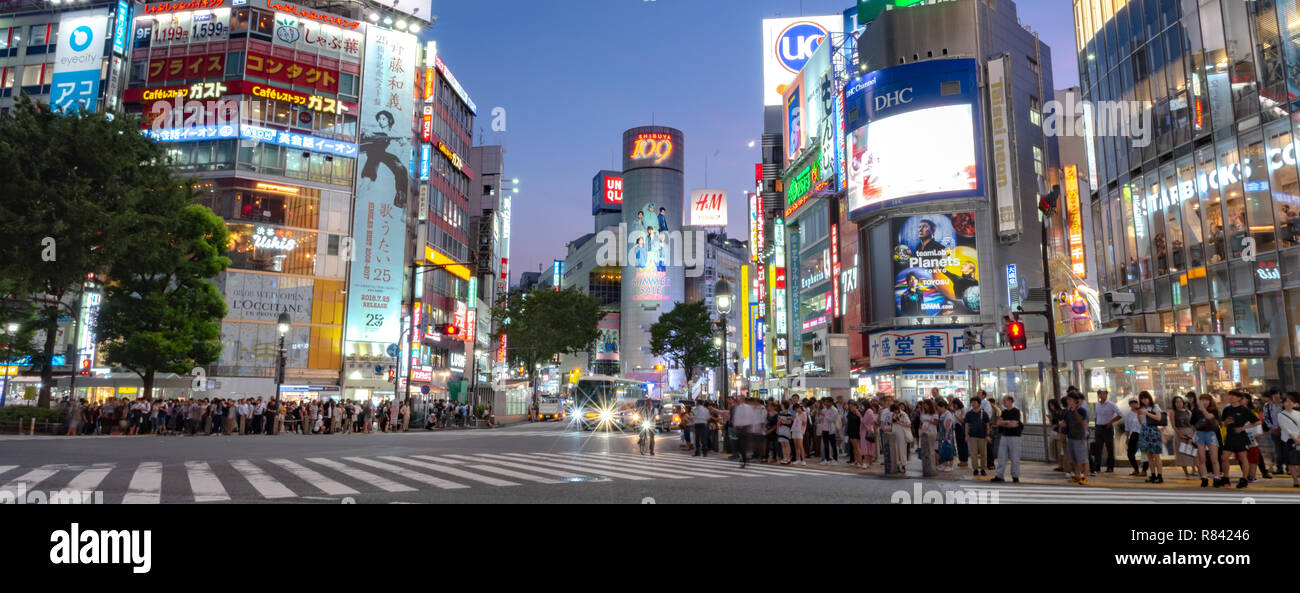 Pedestrians crosswalk at Shibuya district in Tokyo, Japan. Shibuya Crossing is one of the busiest crosswalks in the world. Stock Photo
