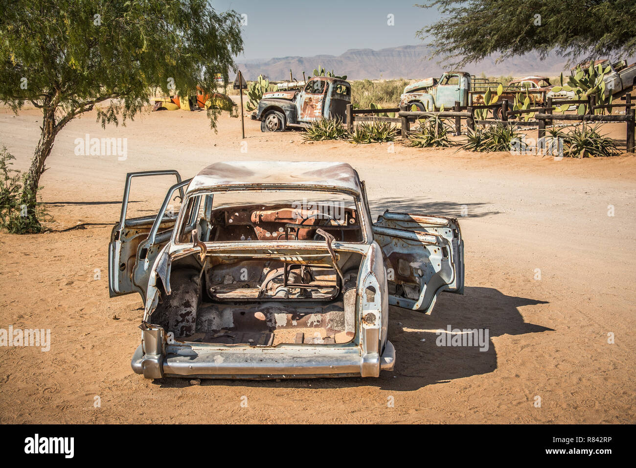 Old cars in the desert Stock Photo