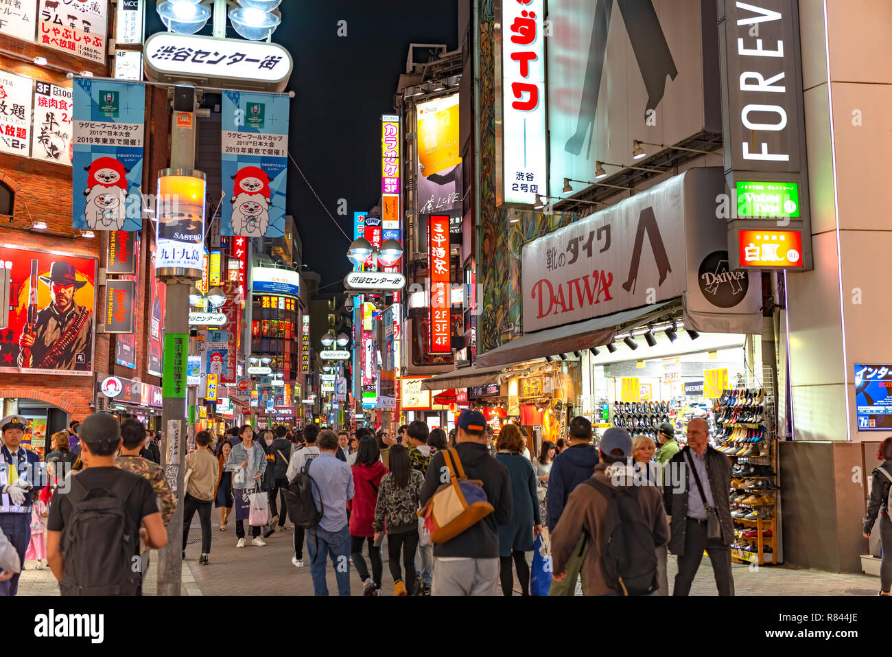 Crowd of people in Shibuya shopping street district in Tokyo