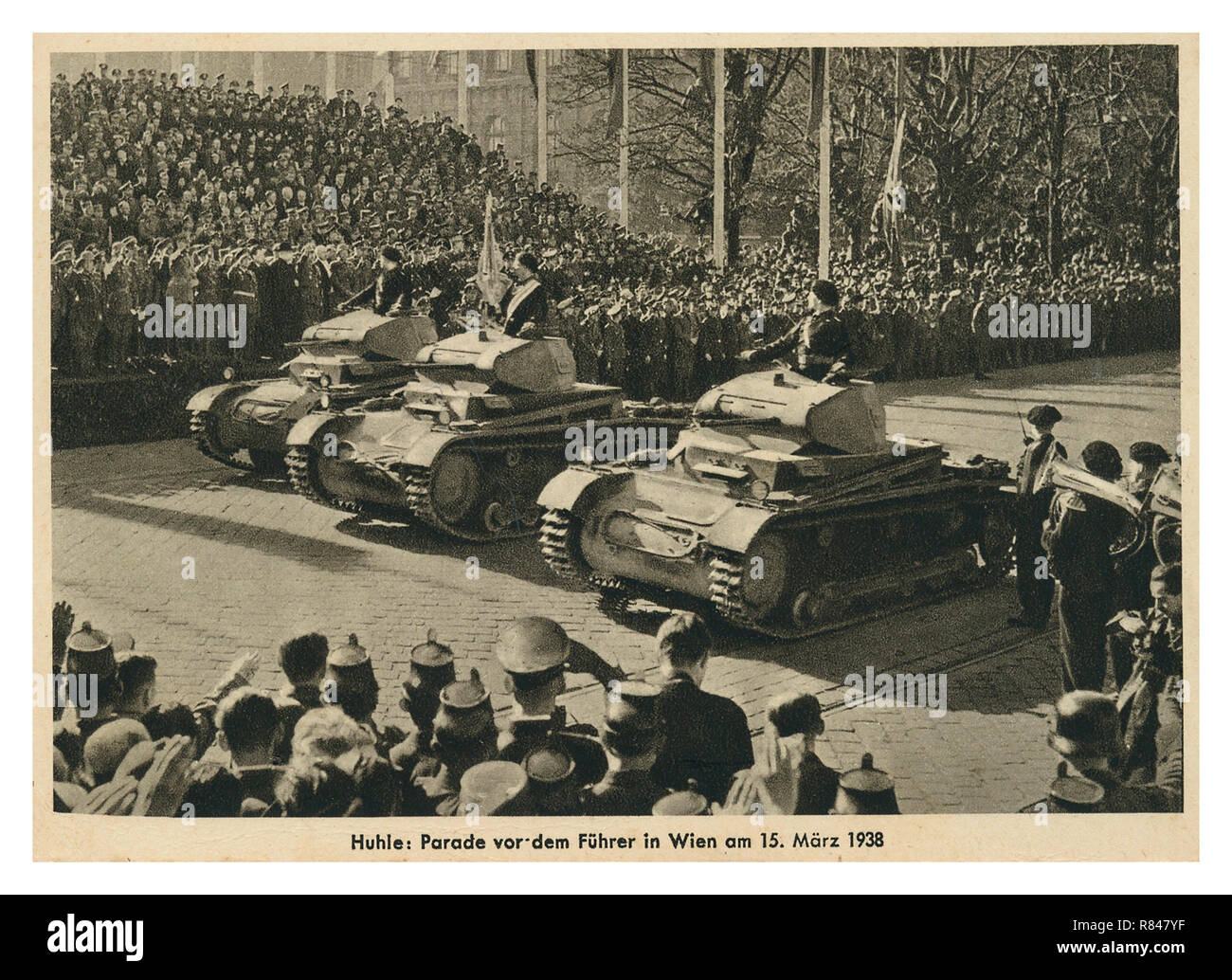 Anschluss Nazi Germany Parade with Adolf Hitler WIEN VIENNA 1938 news archive image Führer Adolf Hitler, takes Military Nazi occupying forces parade, in Vienna Austria. Anschluss Nazi Germany occupation of Austria Stock Photo