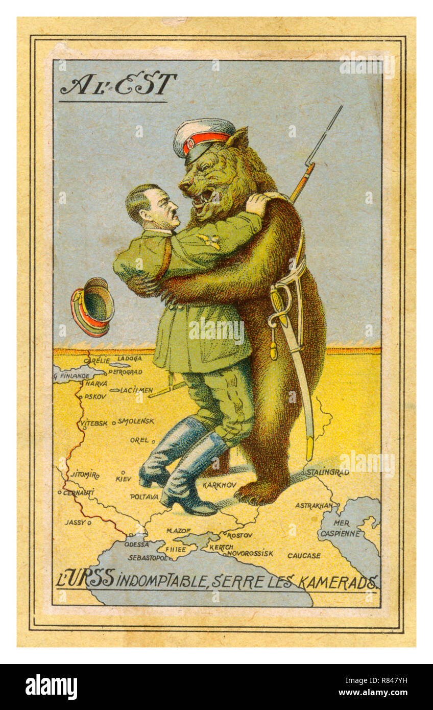 HITLER & RUSSIAN BEAR WW2 Vintage 1940's French Propaganda Postcard illustrating Adolf Hitler in a deadly embrace with a uniformed Red Army Russian Bear comrade standing on a map of the World War II Eastern Front Stock Photo