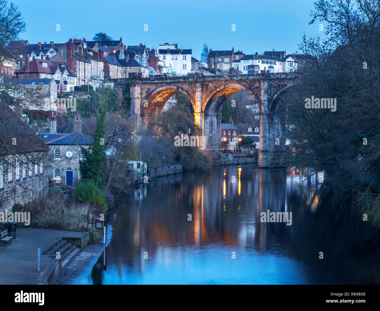 Railway viaduct over the River Nidd at dusk in Knaresborough North Yorkshire England Stock Photo