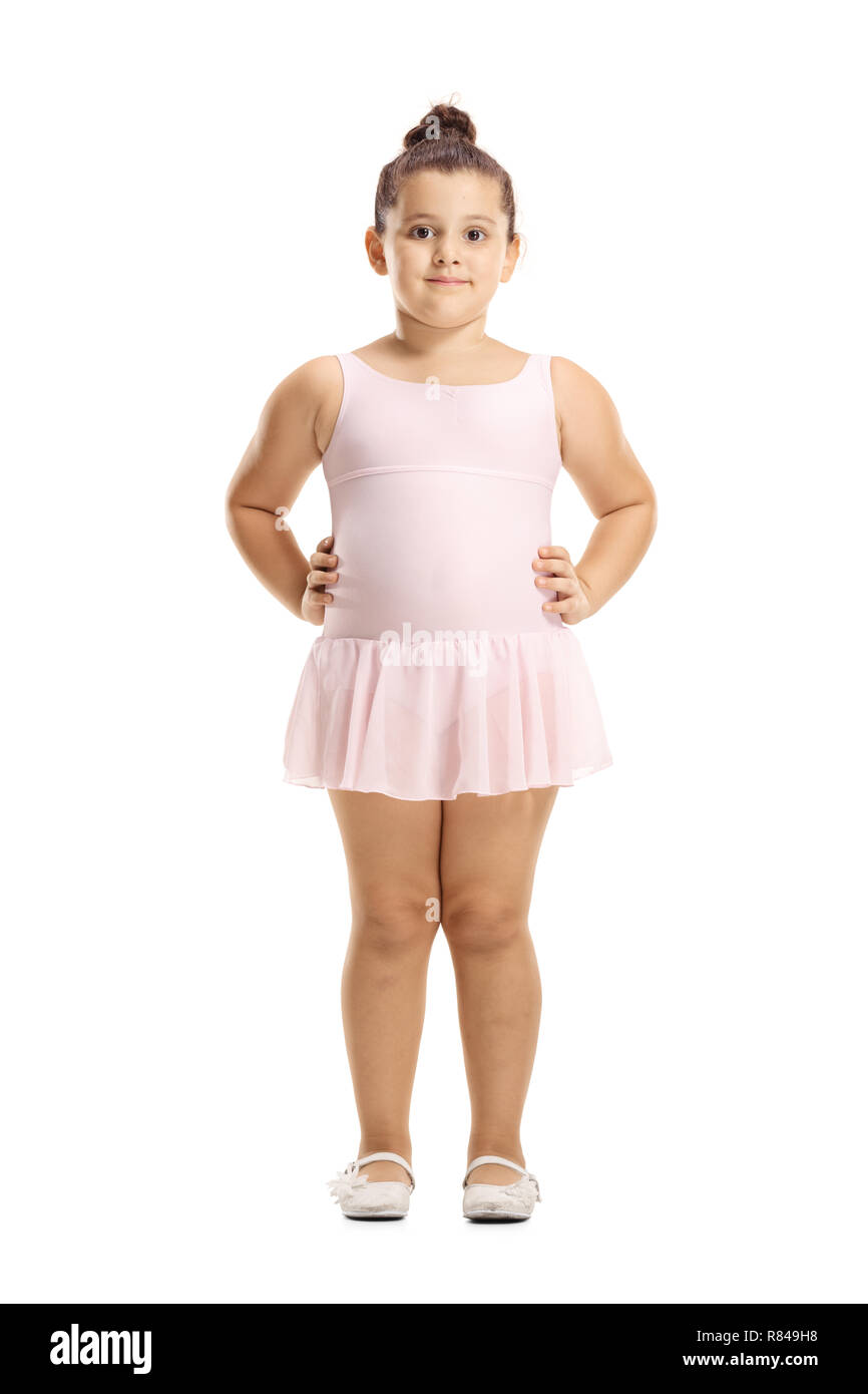 Full Length Portrait Of A Little Girl In A Pink Ballet Dress Posing 