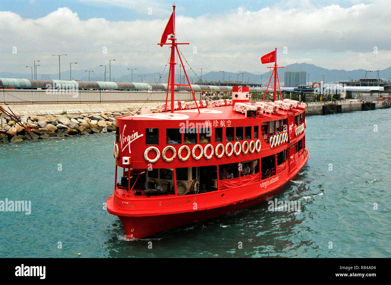 Sponsored red Star Ferry by Virgin Atlantic, Hong Kong Harbour Stock Photo