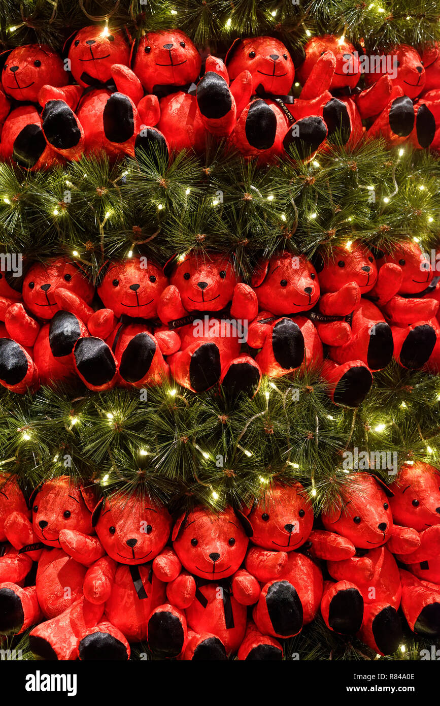 Red teddy bears on the Christmas Tree at the Conrad Hotel, Singapore Stock Photo