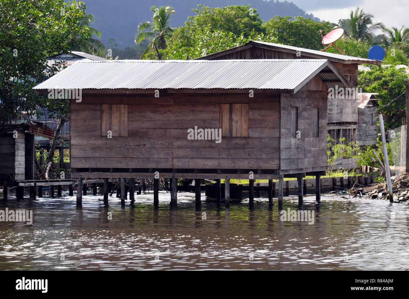 A Wooden House on stilts in the water in Panama Stock Photo Alamy