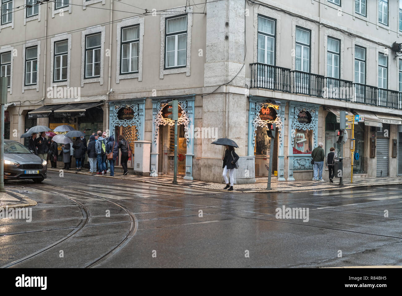 People at the Lisbon Old Town street. Lisbon is the capital of Portugal. Stock Photo