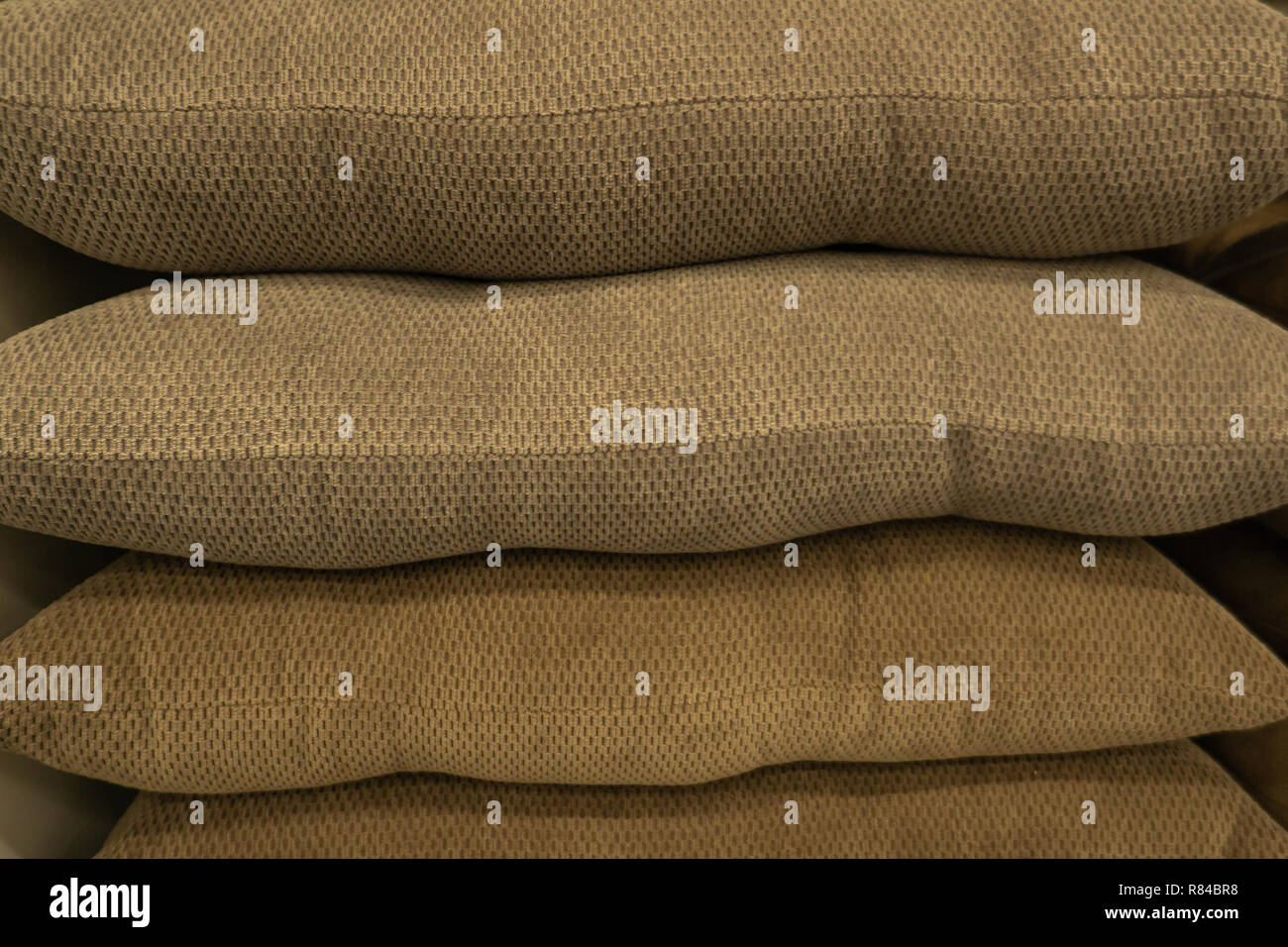 Multicolored cushions or pillows on display in store Stock Photo