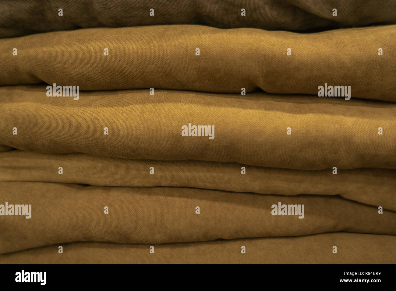 Multicolored cushions or pillows on display in store Stock Photo