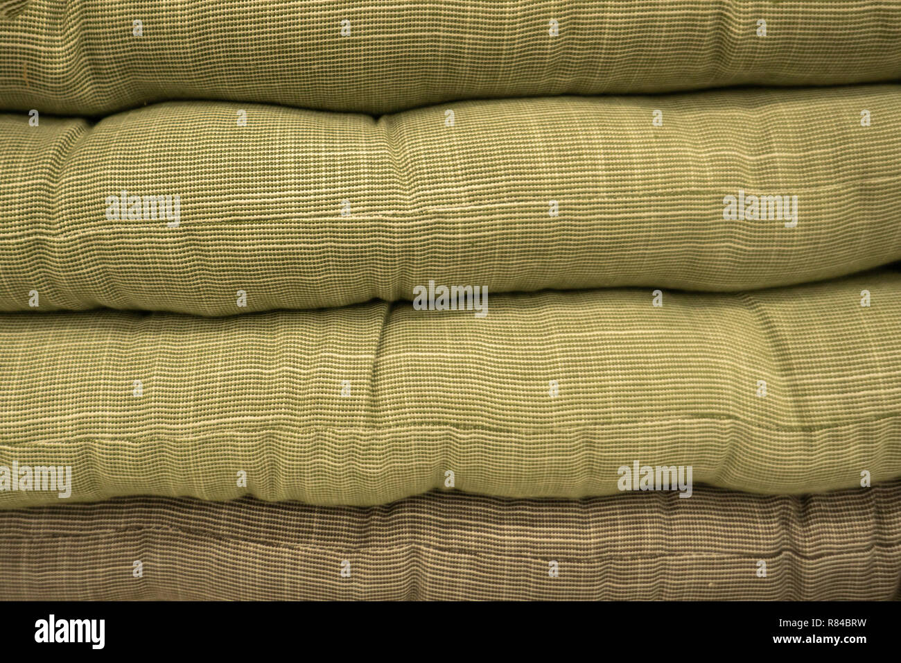 Multicolored cushions or pillows on display in store Stock Photo