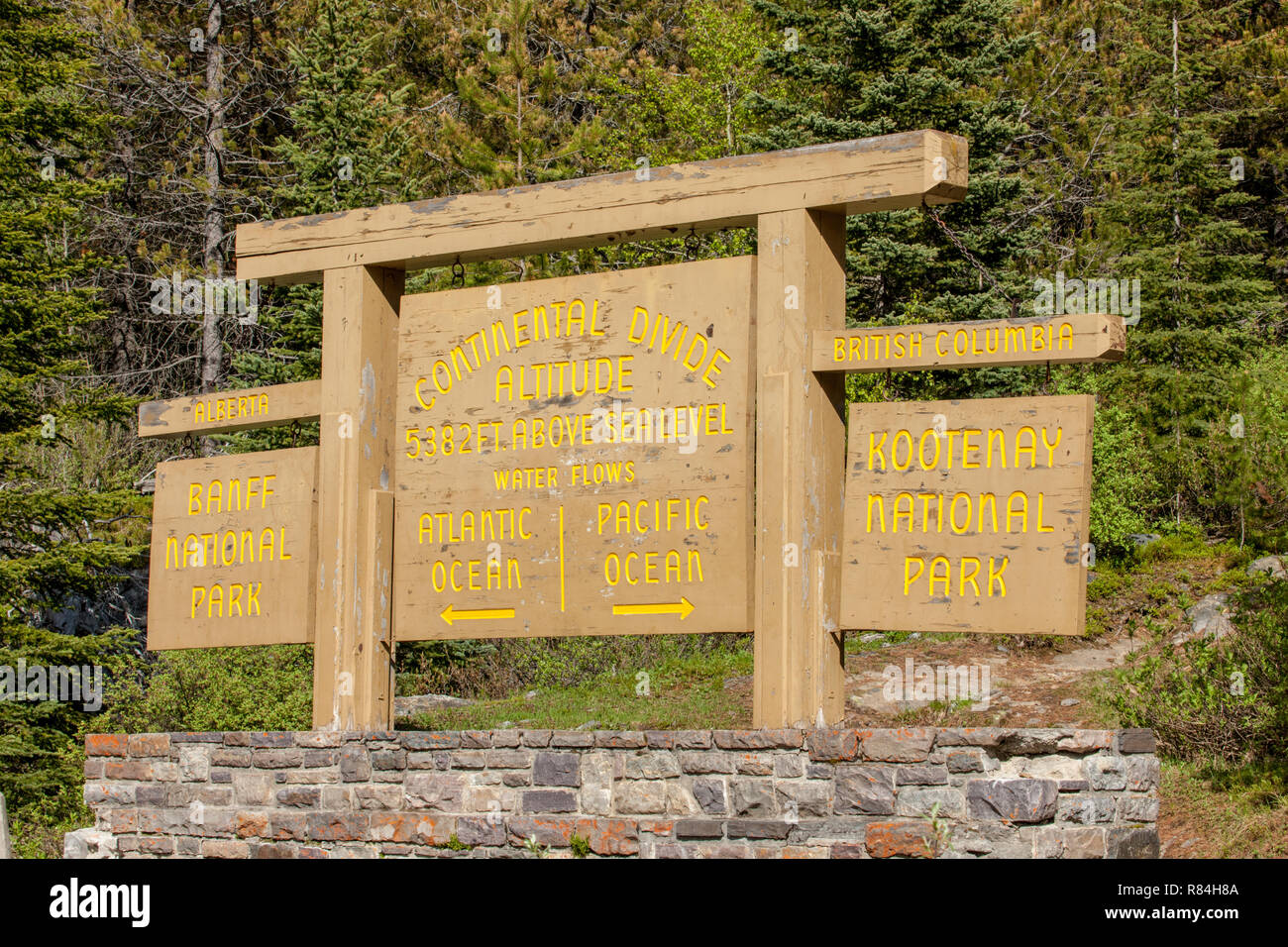 Continental Divide sign splitting Banff National Park, Alberta, and