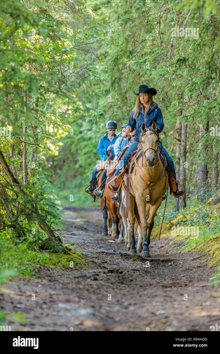 People horseback riding on the Patricia Lake Circle trail near Jasper