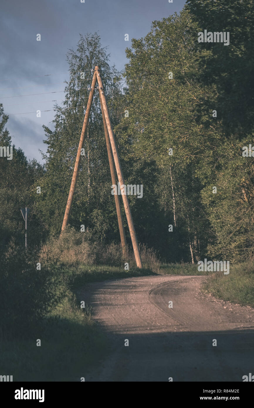 power line electricity poles in country with wires - vintage old film ...