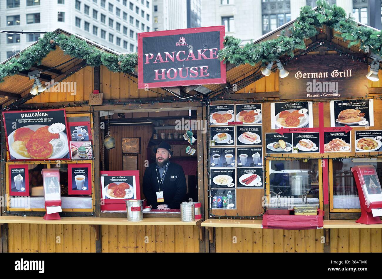 Chicago, Illinois, USA. A German food kiosk at the Christkindlmarket in downtown Chicago. Stock Photo