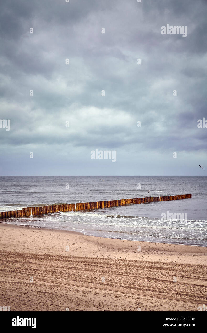Seascape with moody sky, color toning applied. Stock Photo