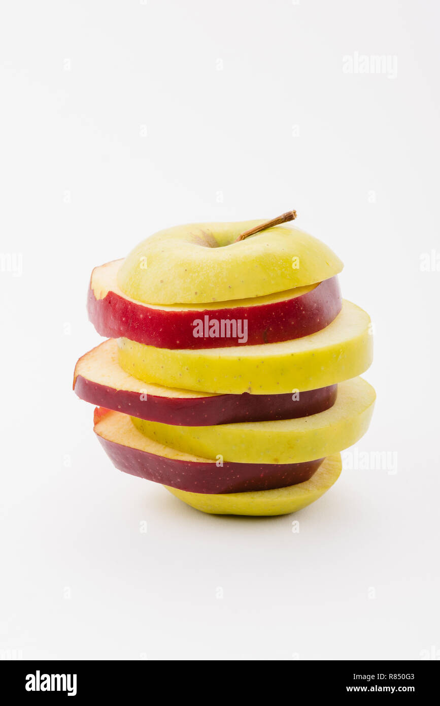 fresh sliced red and golden delicious apples on white background Stock Photo Alamy