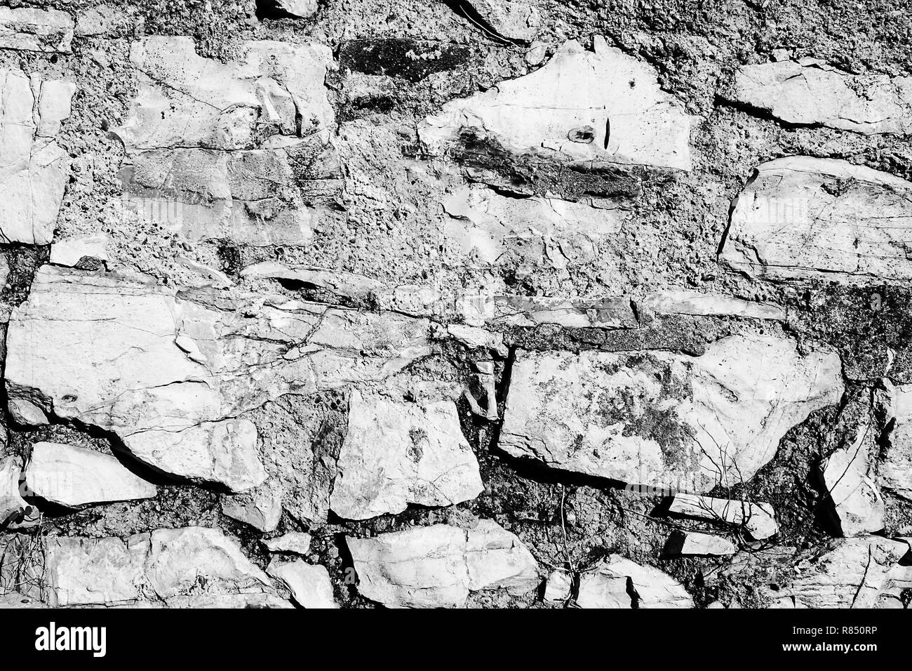Rock bricks patterned laying Black And White Textured Stock Photo