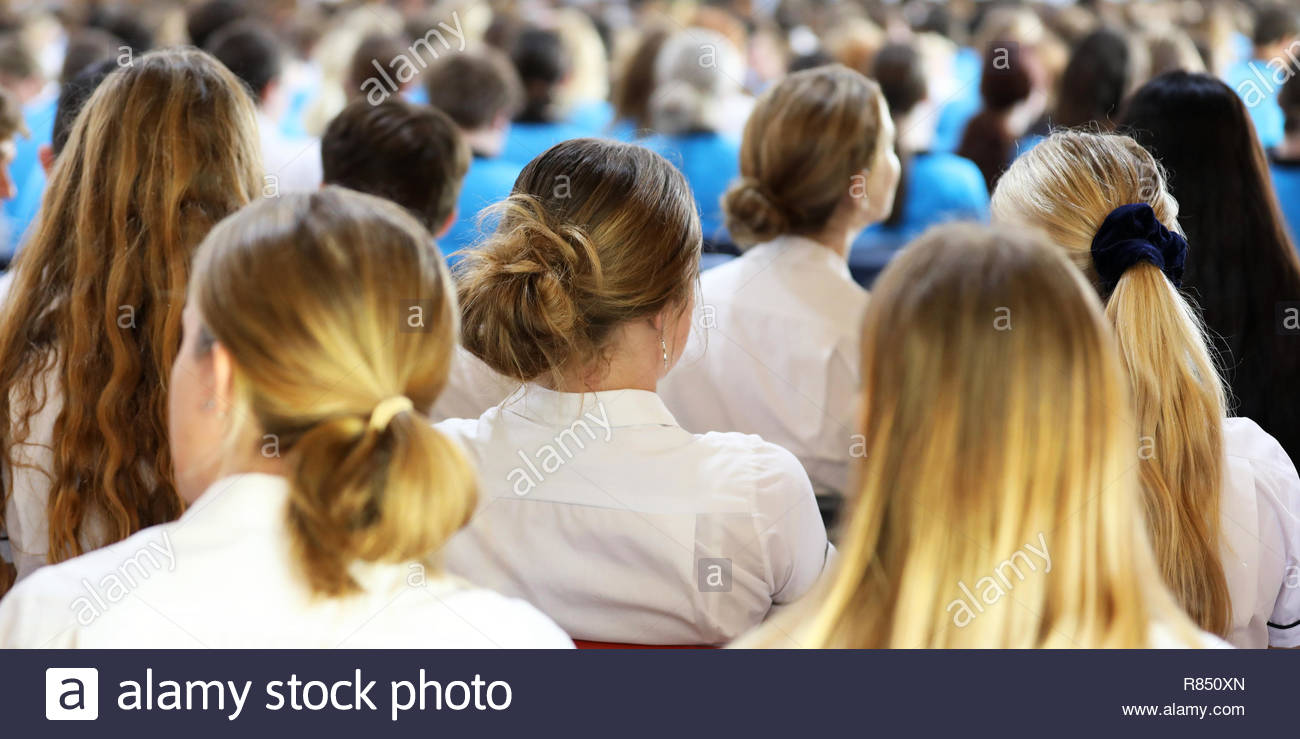 Photograph Shot From Behind Of A Large Group Of Female High School