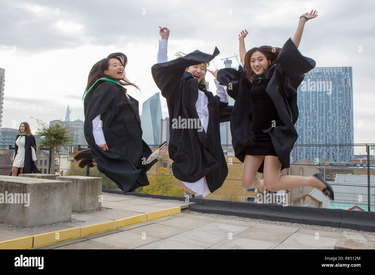 International students celebrating graduation Stock Photo - Alamy