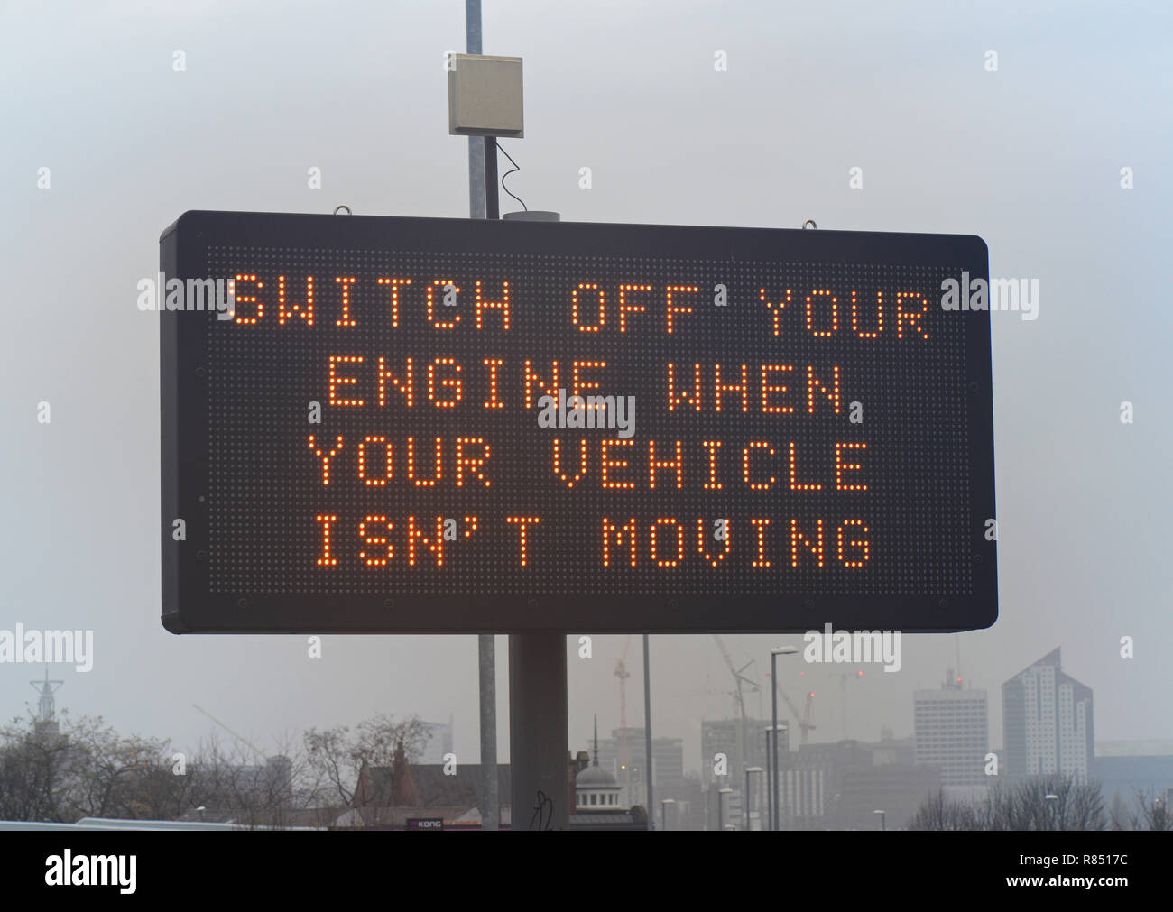digital road sign requesting drivers to turn off engines when not