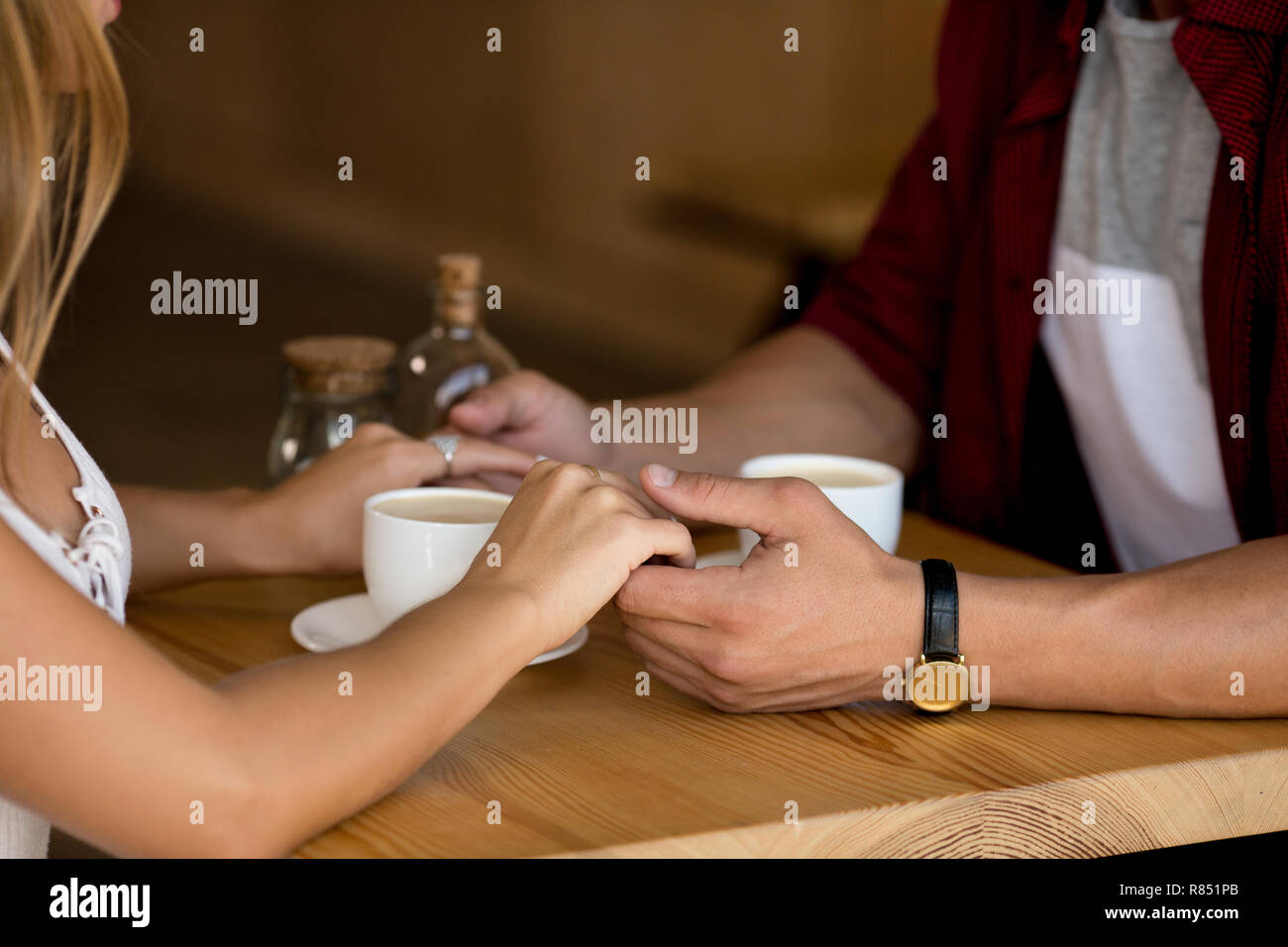 Cute couple having coffee together in cafe Stock Photo