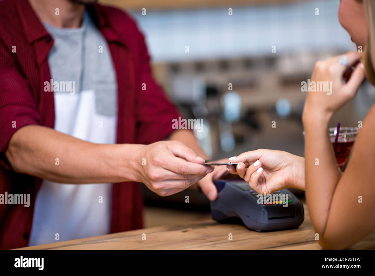 Paying by credit card in cafe Stock Photo