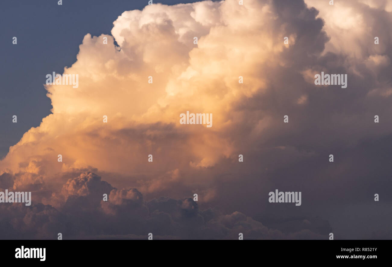 close up soft focus dramatic twilight sunset fluffy cloud on blue sky Stock Photo