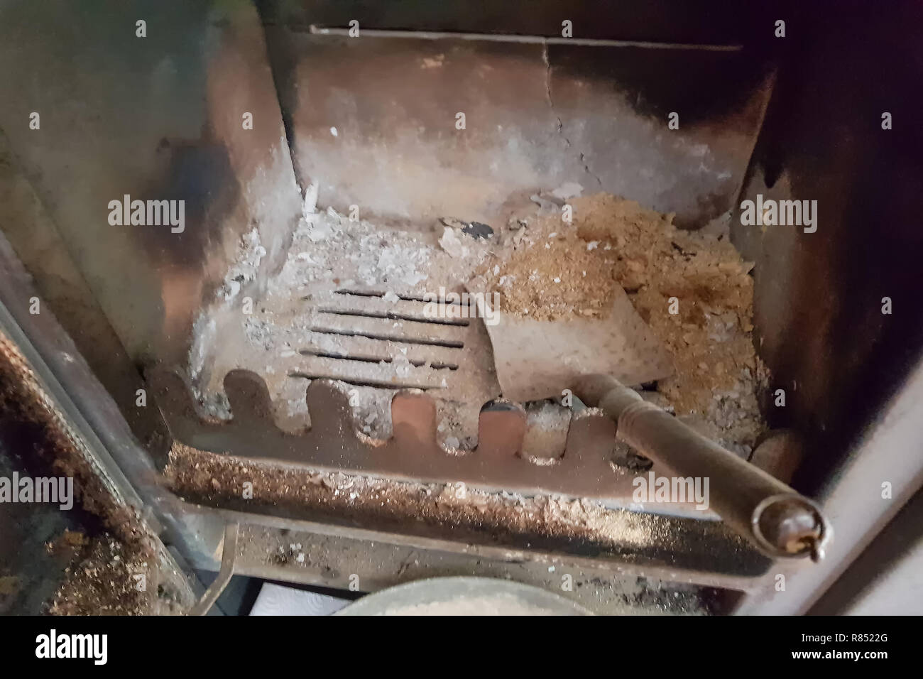 Clean The Fireplace Ashes And Charred Pieces Of Wood Discard