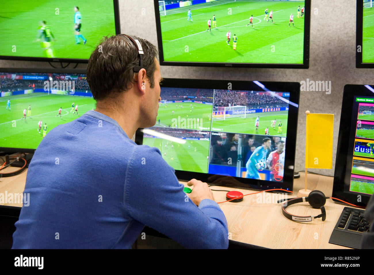 VAR referee Bas Nijhuis working at the VAR center in the headquarters of the Dutch football association. Stock Photo