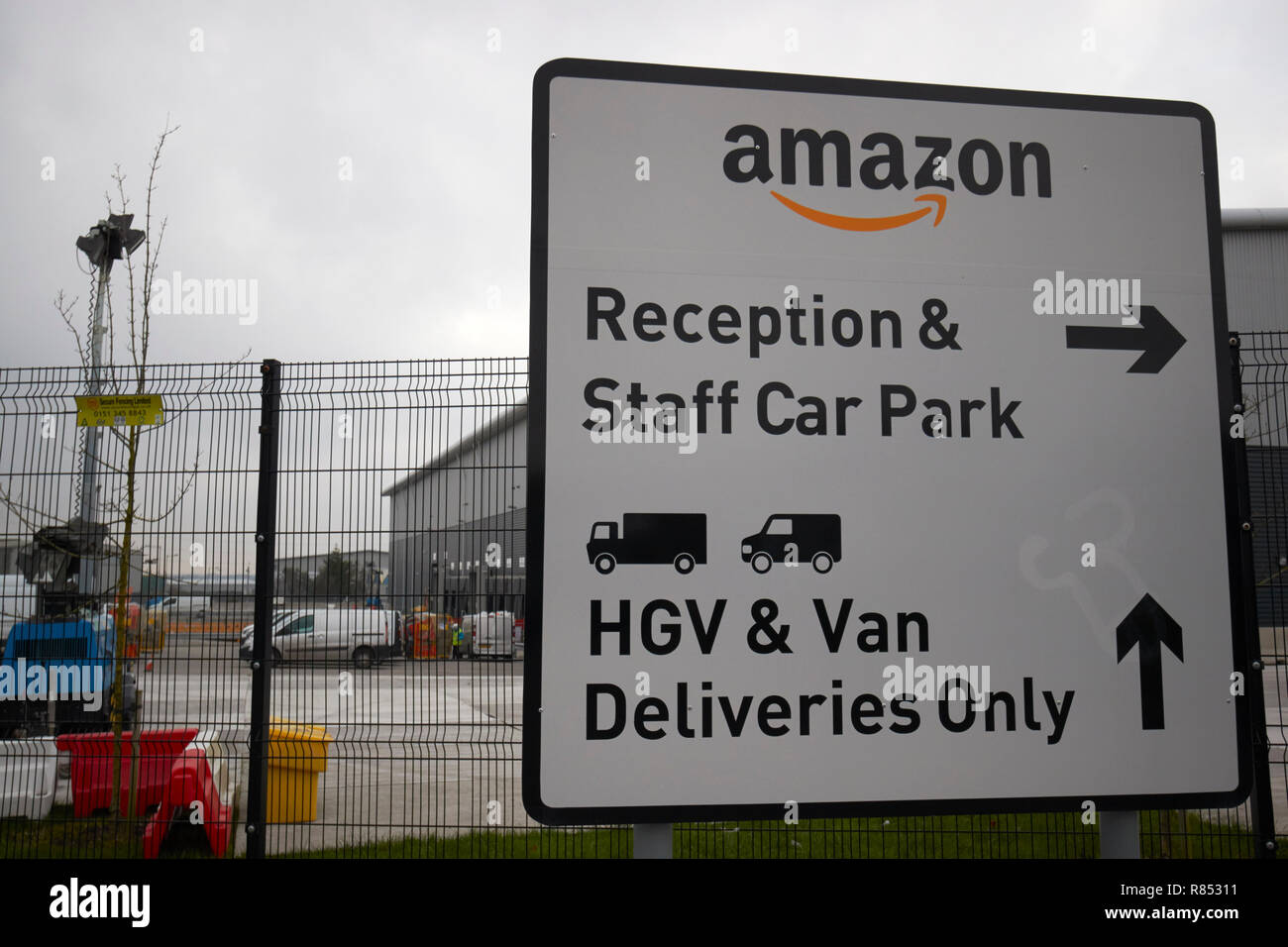 direction signs outside knowsley amazon depot merseyside england uk