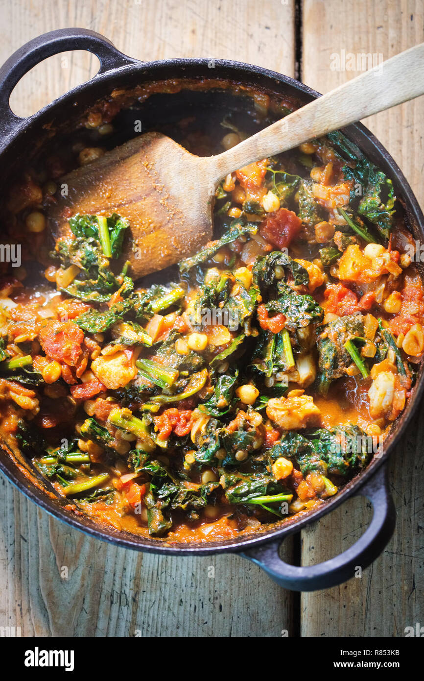 Kale chickpeas curry in tomato sauce Stock Photo Alamy