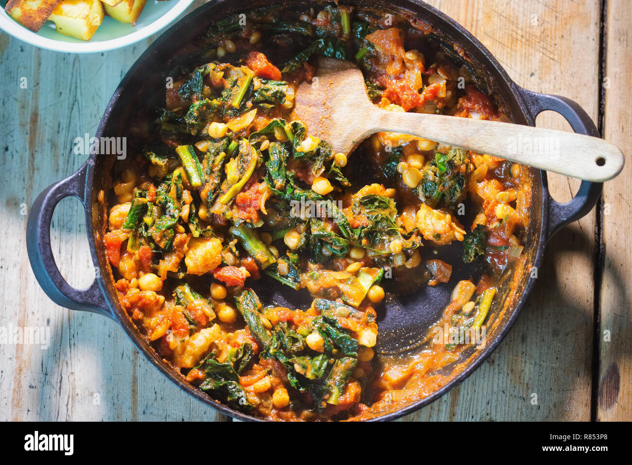 Kale chickpeas curry in tomato sauce Stock Photo Alamy