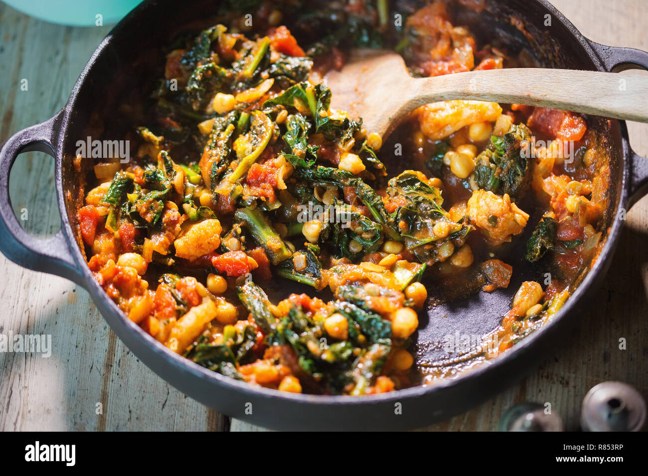 Kale chickpeas curry in tomato sauce Stock Photo Alamy