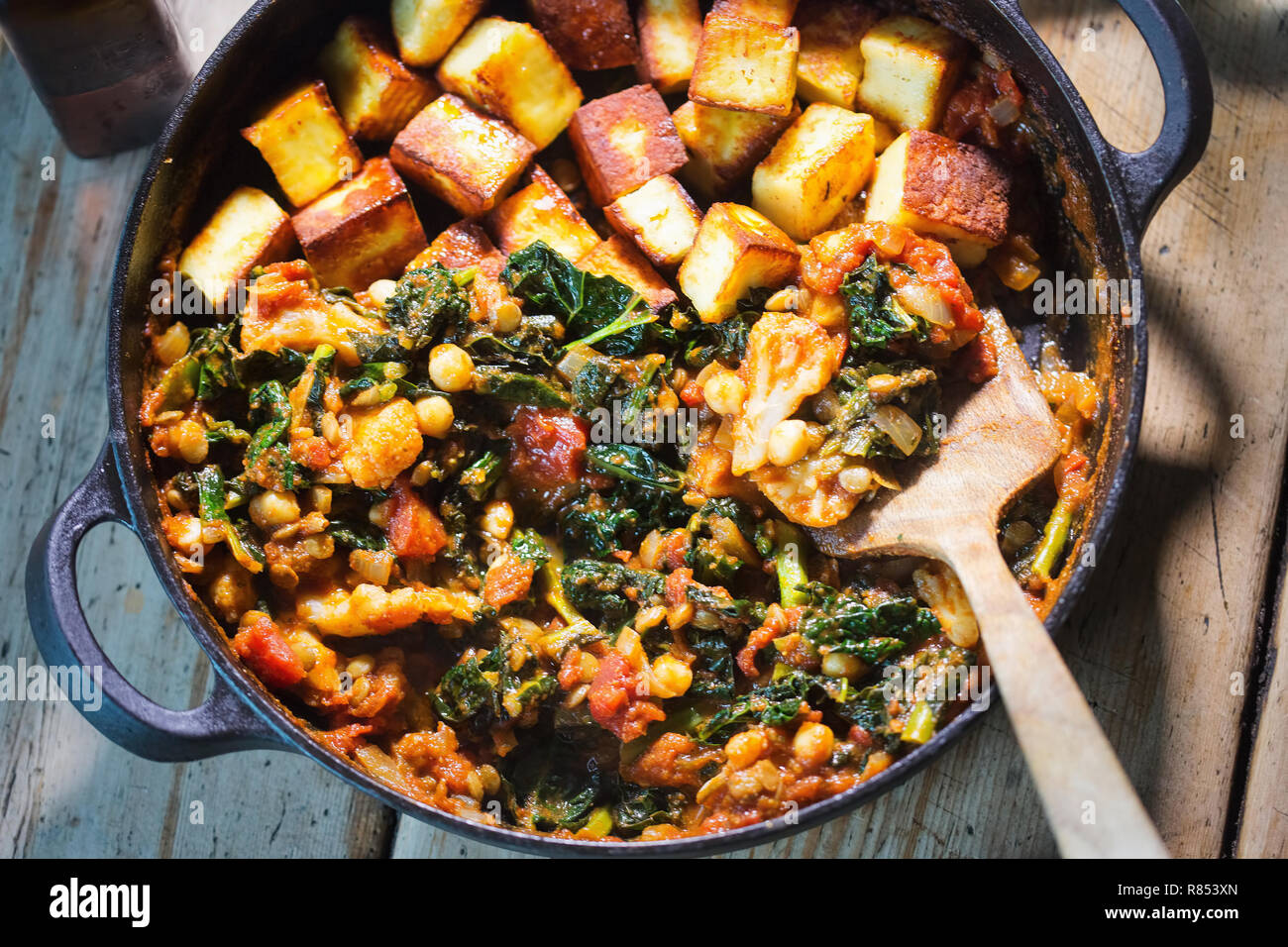 Kale chickpeas curry in tomato sauce with fried paneer Stock Photo Alamy