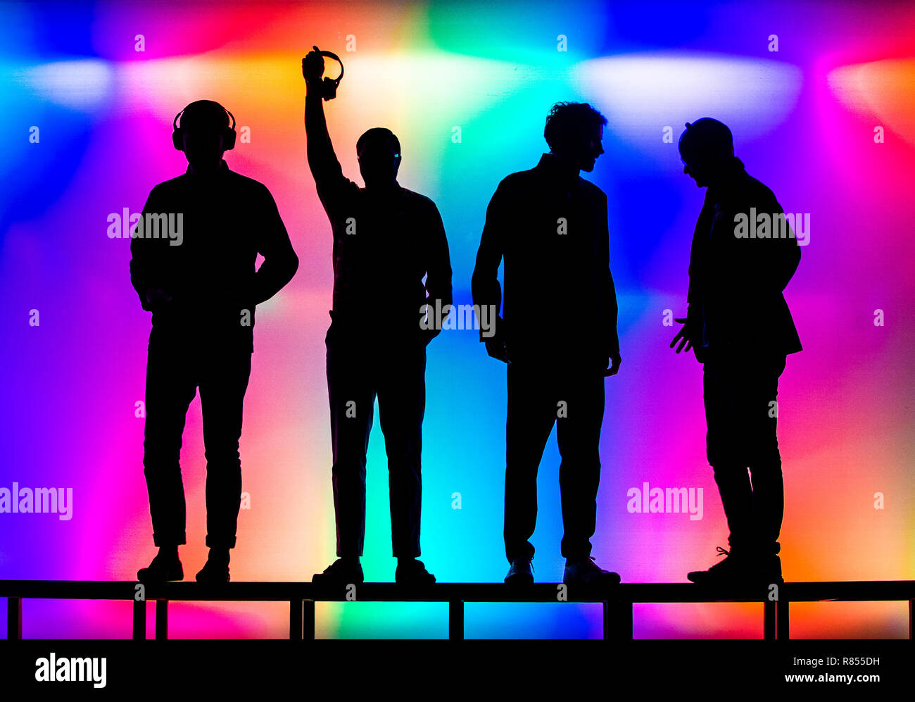 Members of the the Kaiser Chiefs are silhouetted during a silent gig as they launch When All is Quiet: Kaiser Chiefs in Conversation at York Art Gallery. Stock Photo