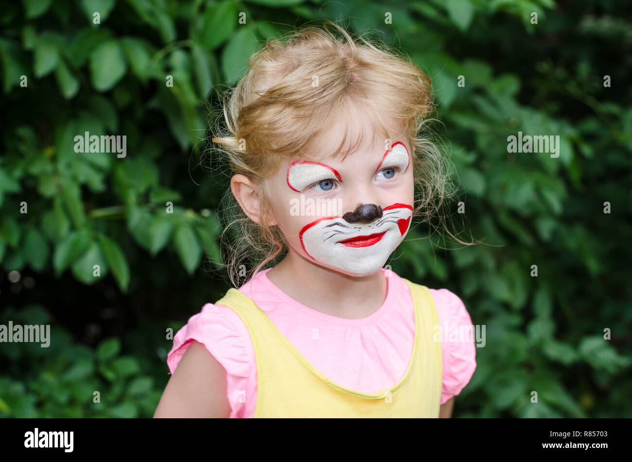 blond girl with face painting Stock Photo