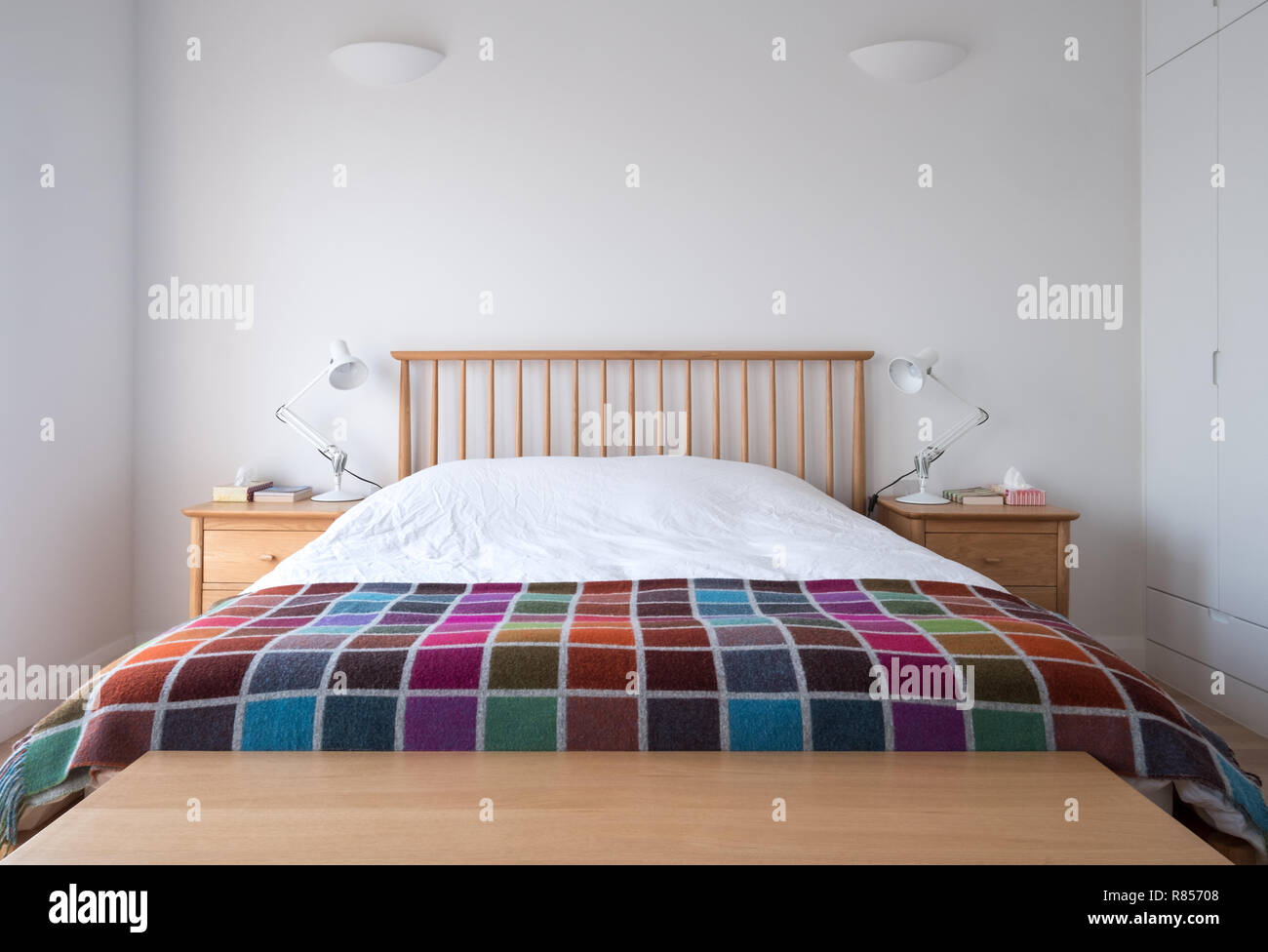 Scandi style, minimalist, uncluttered bedroom interior with wooden