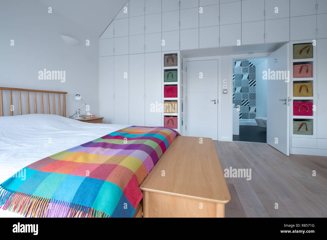 Scandi style, minimalist, uncluttered bedroom interior with wooden