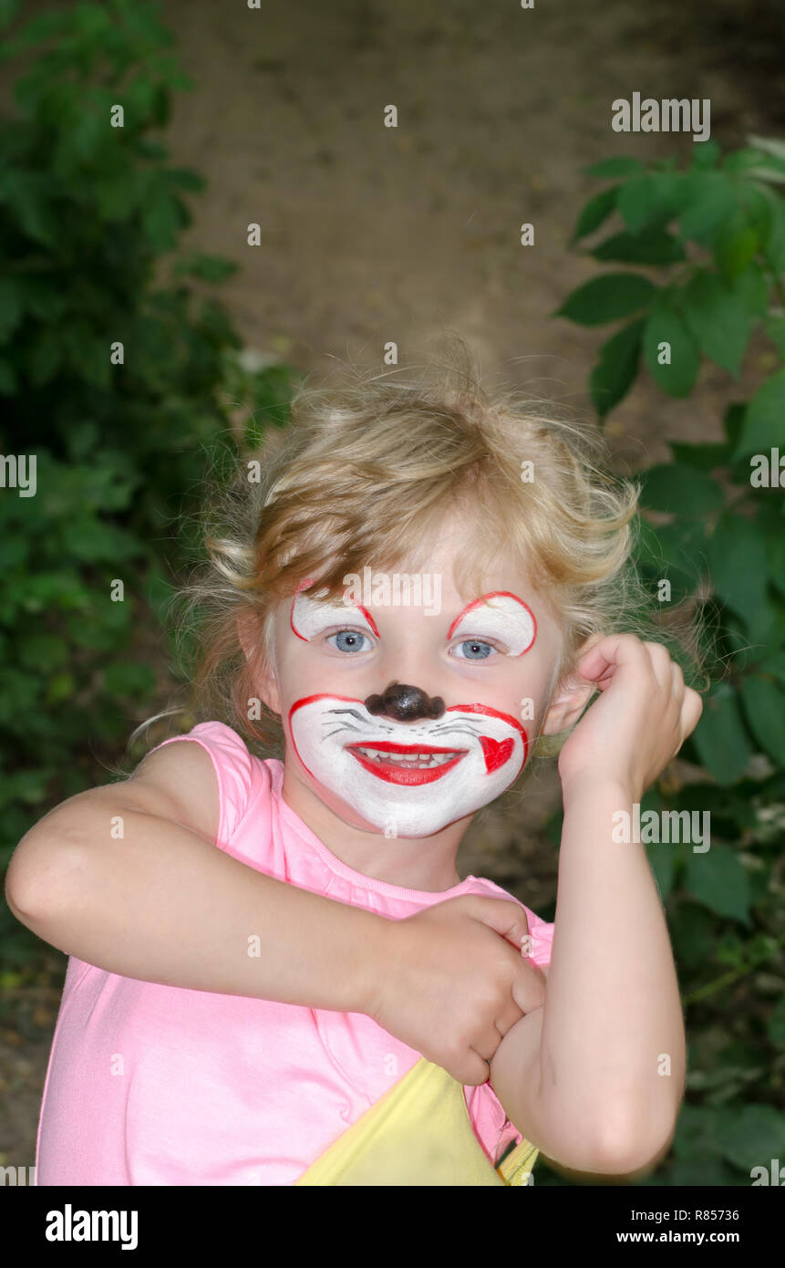 blond girl with face painting Stock Photo