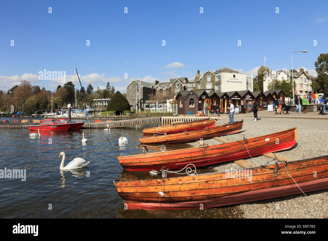Wooden rowing boats for hire on Windermere lakeside in the Lake