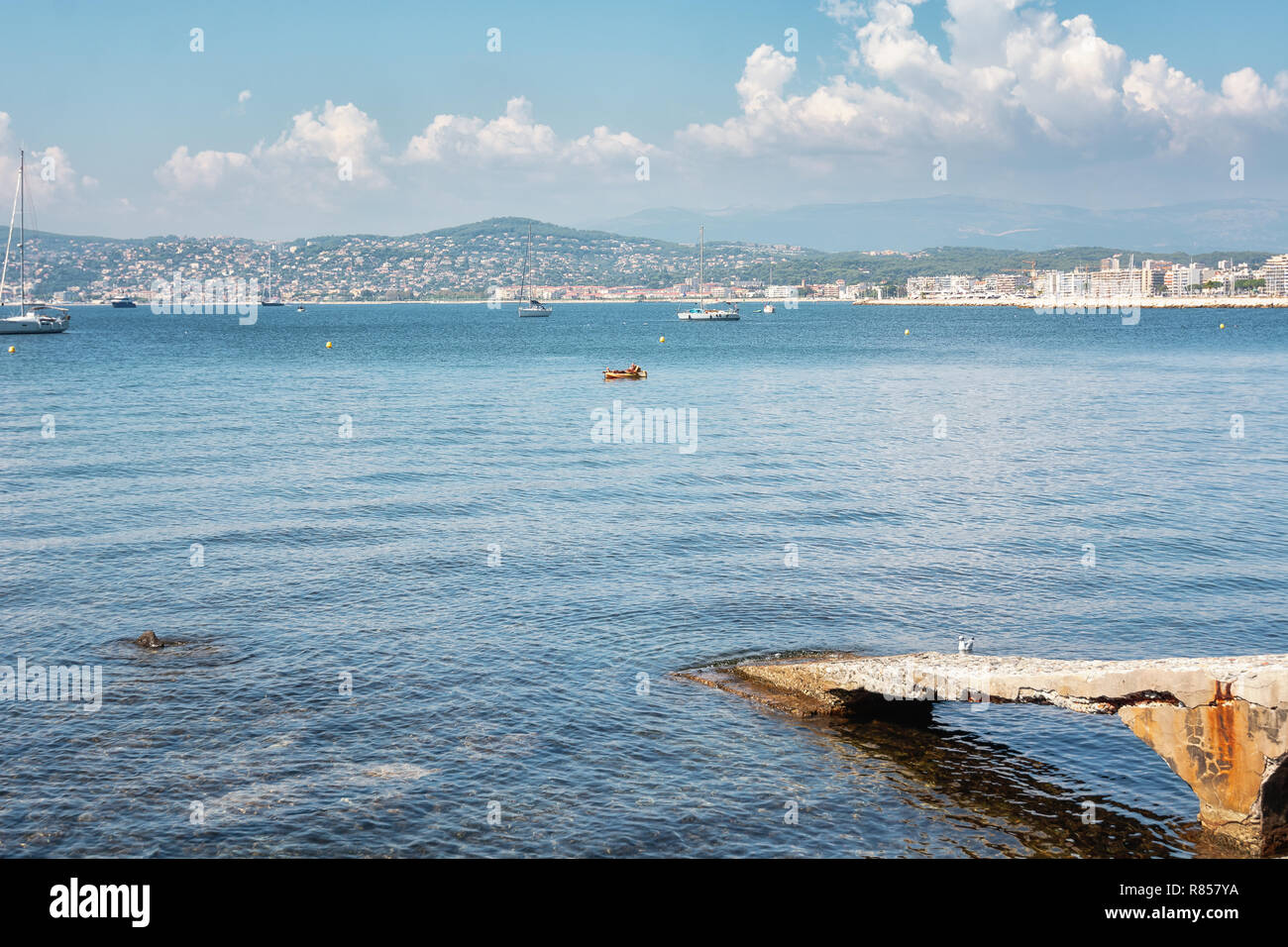 Juan-les-Pins, France, September 19, 2018: kayaker resting in the Golfe Juan with in the background the hotels of the French city of Juan-les-Pins Stock Photo