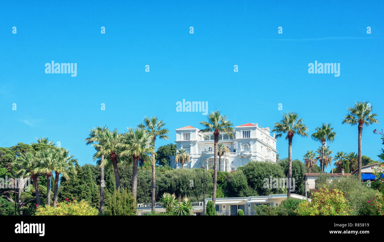 Juan-les-Pins, France, September 19, 2018: Beautiful white villa on the hill in the beach resort of Juan-les-Pins in France Stock Photo