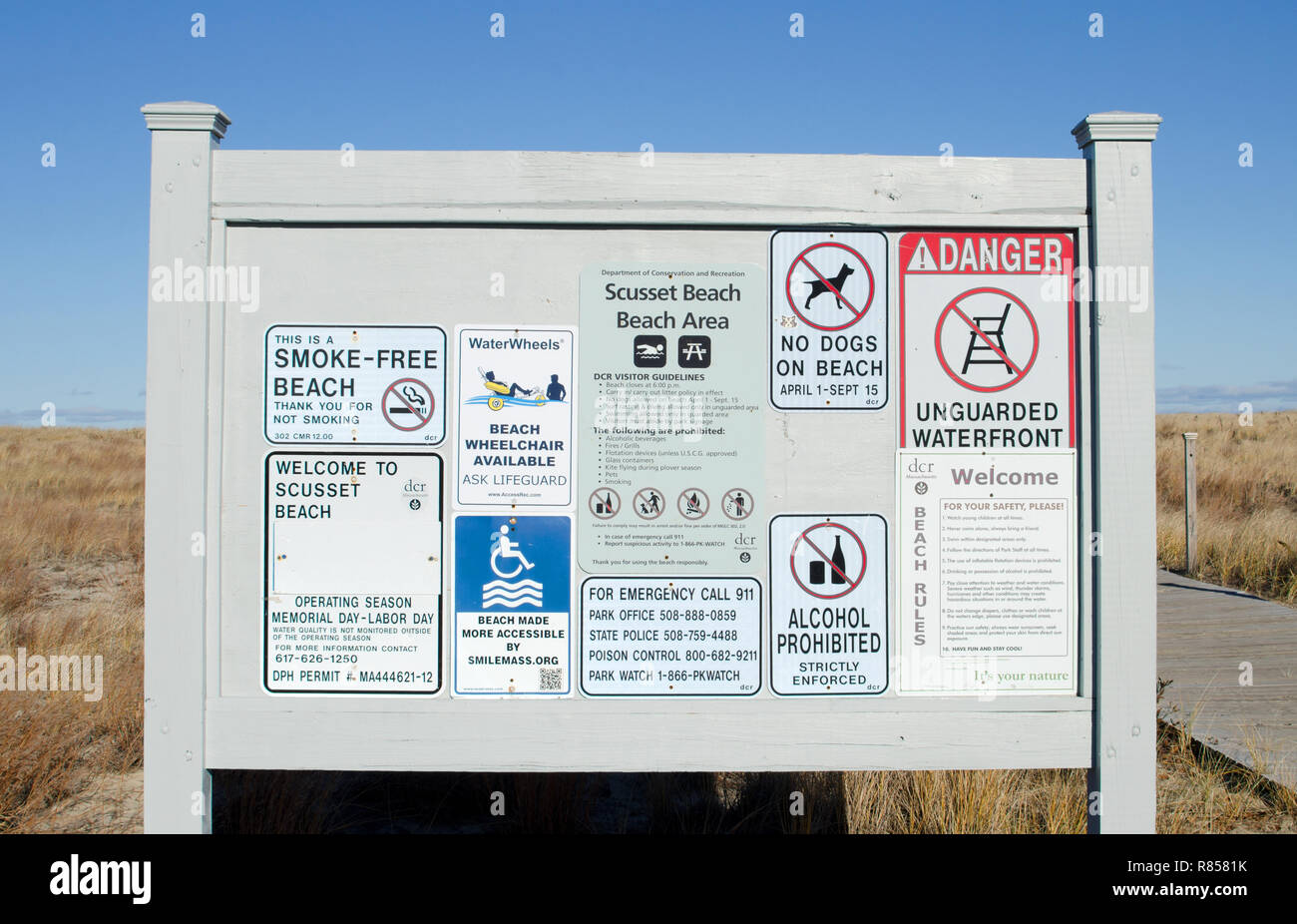 Sign board with rules and regulations at Scusset Beach, Cape Cod in Sagamore, Bourne, Massachusetts USA with no alcohol allowed, no smoking, no dogs Stock Photo