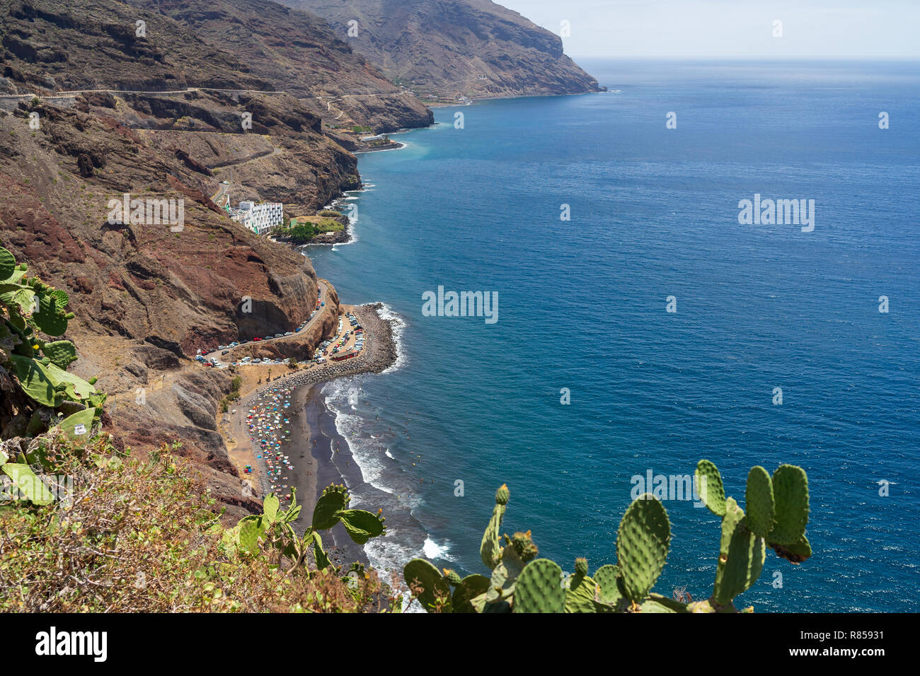 View of the beach with volcanic black sand - Playa de Las Gaviotas and the  rocky shore from the observation deck Mirador Las Teresitas. Tenerife. Cana  Stock Photo - Alamy