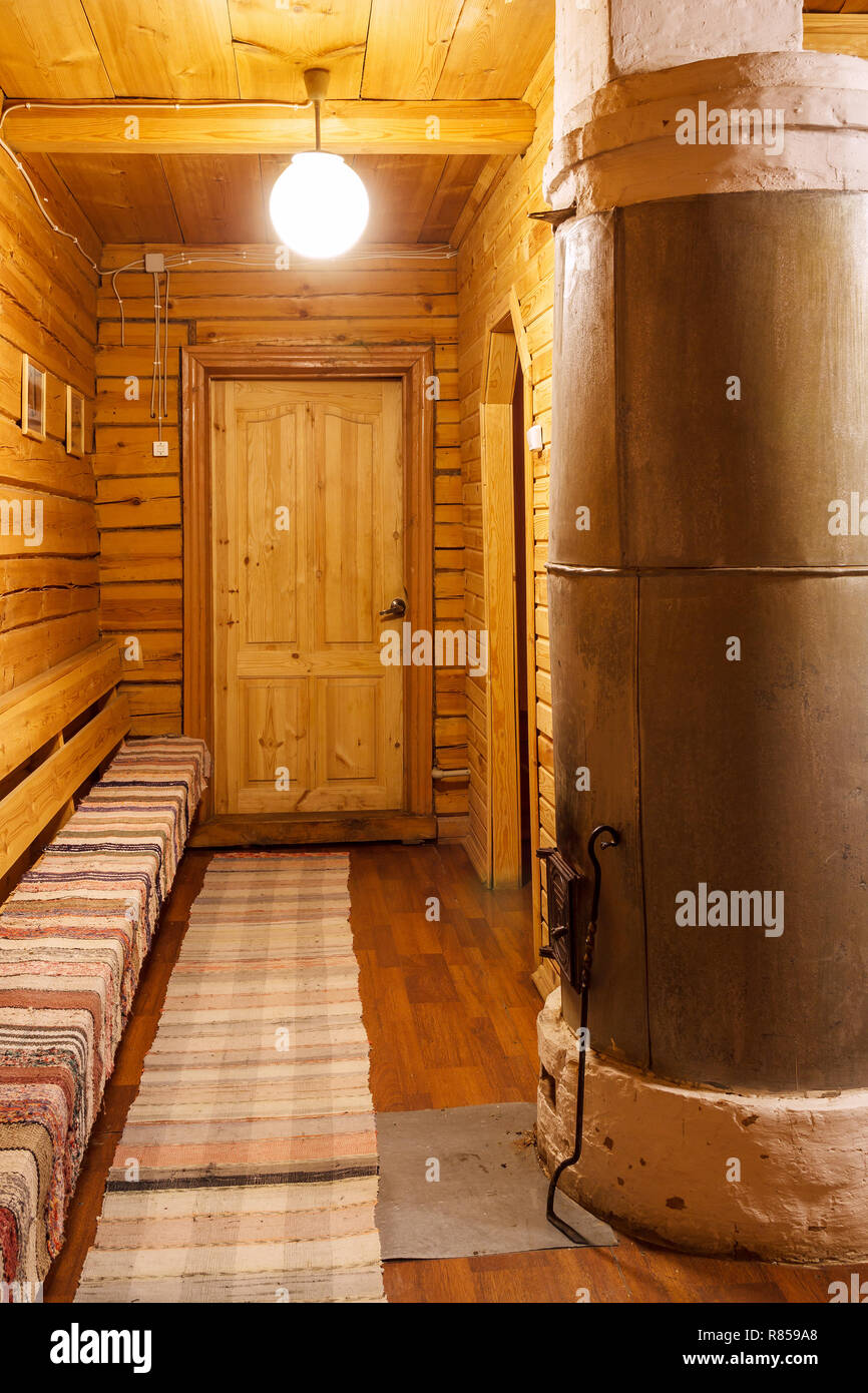 Corridor with bake in a wooden house Stock Photo