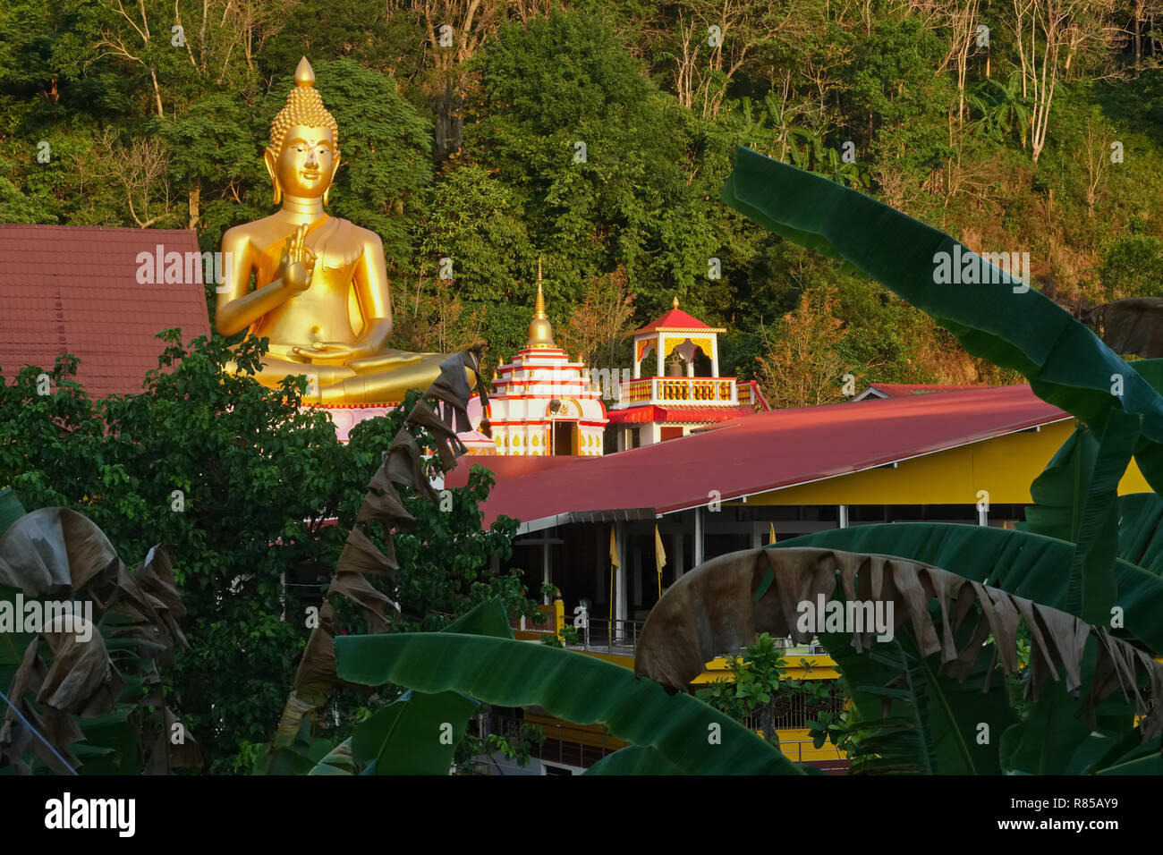 The big Buddha of Wat Khao Rang Samakkitham, at the  foot of Khao Rang or Rang Hill,  Phuket Town, Phuket, Thailand Stock Photo