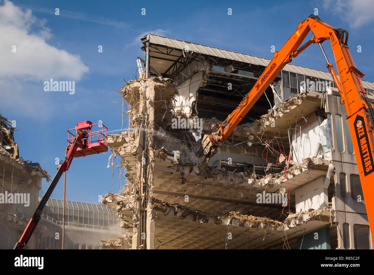 Demolition in progress of the iconic seventies Metal Box Building, Reading, Berkshire, later known as Energis House. Stock Photo