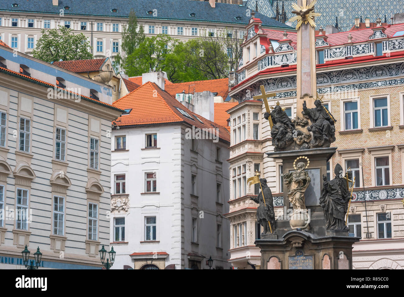 Prague Baroque, view of the 17th century Plague Monument and Baroque buildings sited in Malostranske Namesti in the Mala Strana area of Prague. Stock Photo