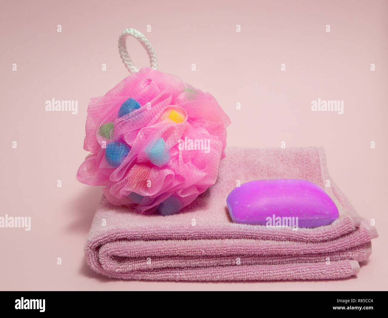 set of shower spa goods for woman pink towel, funny colored sponge